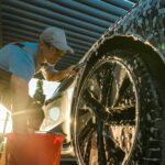 Car Owner Hand Washing His Modern Vehicle