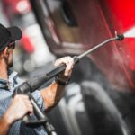 Driver Washing His Semi Truck