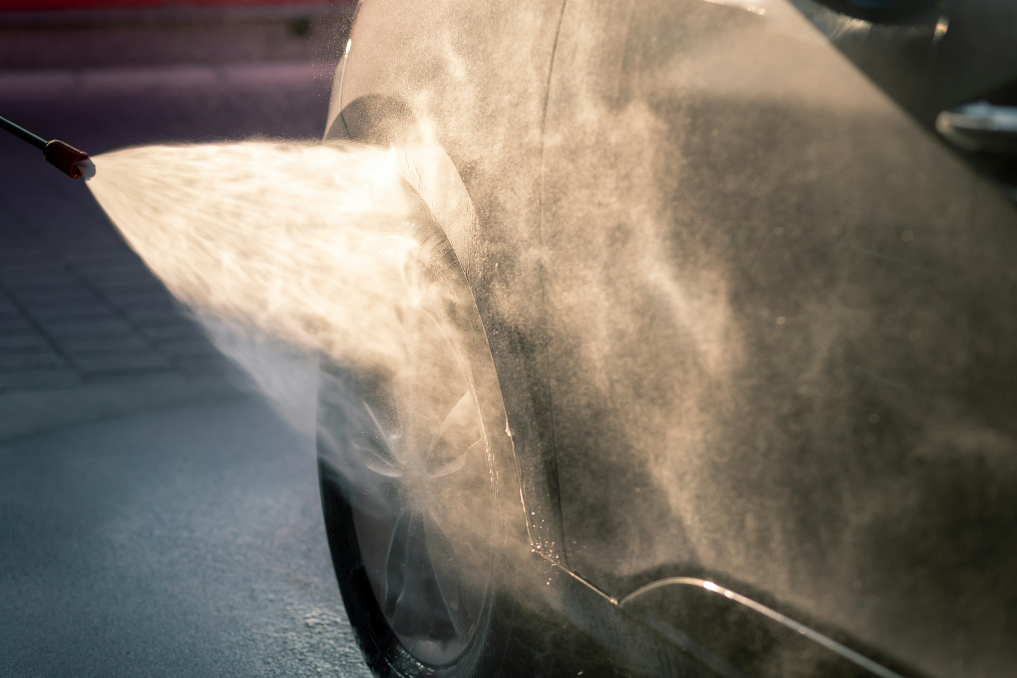 Detail of car washing in a car wash